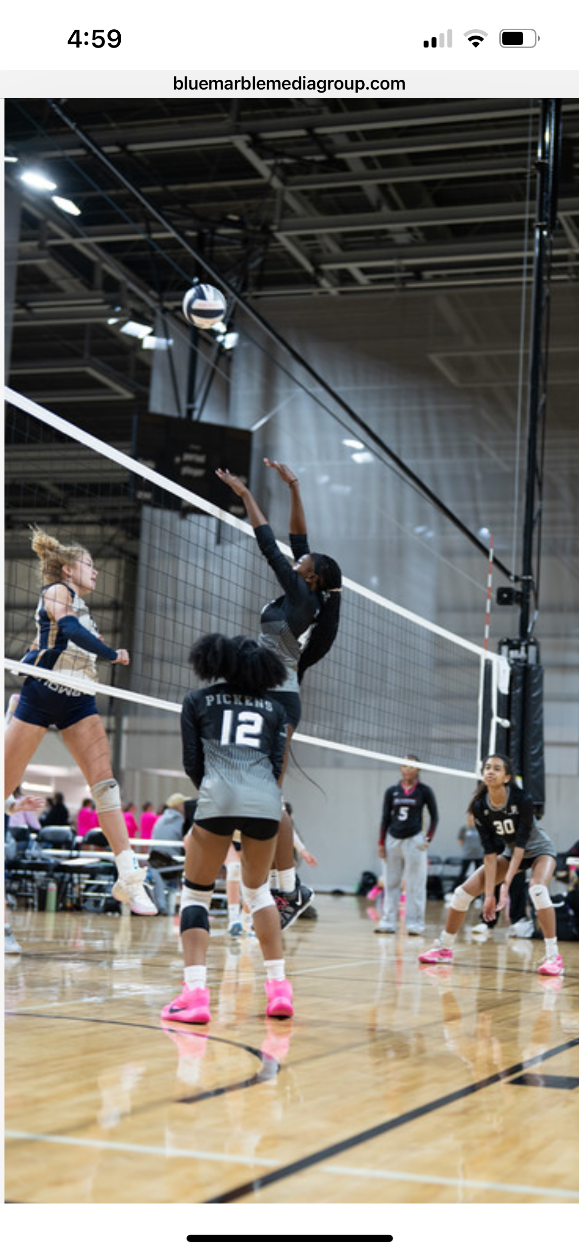 Volleyball action at the net